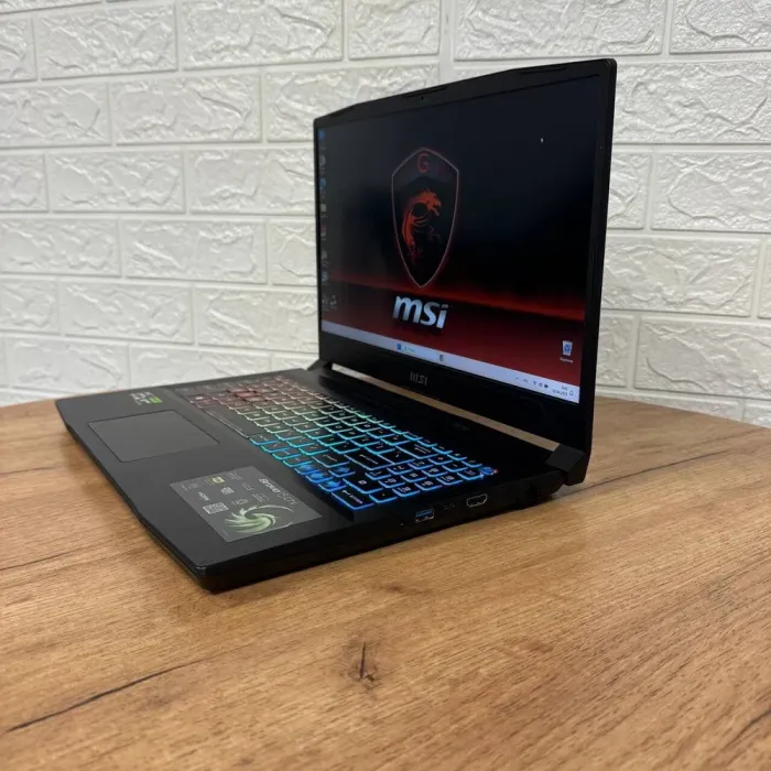 Ігровий ноутбук MSI Bravo 15 C7VFK / 15.6" (1920x1080) IPS / AMD Ryzen 7 7735HS (8 (16) ядер по 3.2 - 4.75 GHz) / 16 GB DDR5 / 1000 GB SSD NVMe / nVidia GeForce RTX 4060, 8 GB GDDR6, 128-bit / WebCam б/в - зображення 5