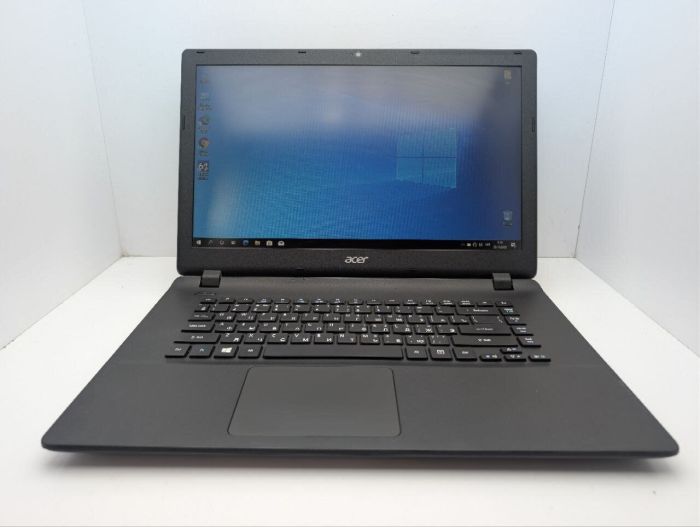 Ноутбук Acer Aspire ES1-521 / 15.6" (1366x768) TN / AMD E2-6110 (4 ядра по 1.5 GHz) / 8 GB DDR3 / 128 GB SSD / AMD Radeon R2 Graphics / WebCam / DVD-ROM б/в - зображення 2