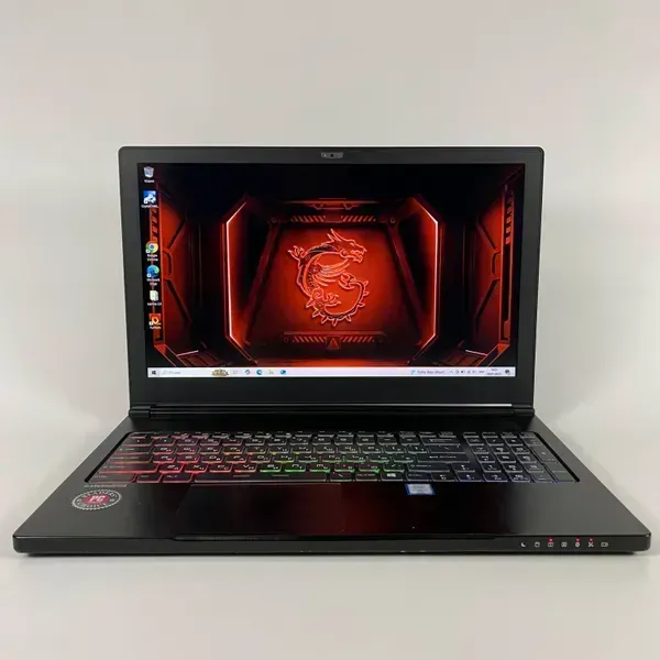 Ігровий ноутбук Б-клас MSI GS63VR 6RF / 15.6" (1920x1080) IPS / Intel Core i7-6700HQ (4 (8) ядра по 2.6 - 3.5 GHz) / 16 GB DDR4 / 128 GB SSD + 1000 GB HDD / nVidia GeForce GTX 1060, 6 GB GDDR5, 192-bit / WebCam / HDMI б/в - зображення 2