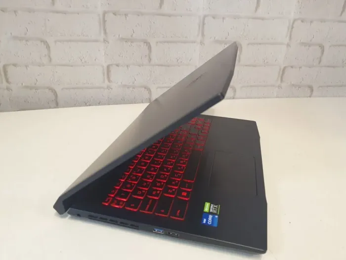 Ігровий ноутбук MSI Katana GF66 11UE-1006NEU / 15.6" (1920x1080) IPS / Intel Core i5-11400H (6 (12) ядер по 2.2 - 4.5 GHz) / 16 GB DDR4 / 512 GB SSD / nVidia GeForce RTX 3060, 6 GB GDDR6, 192-bit / WebCam б/в - зображення 4