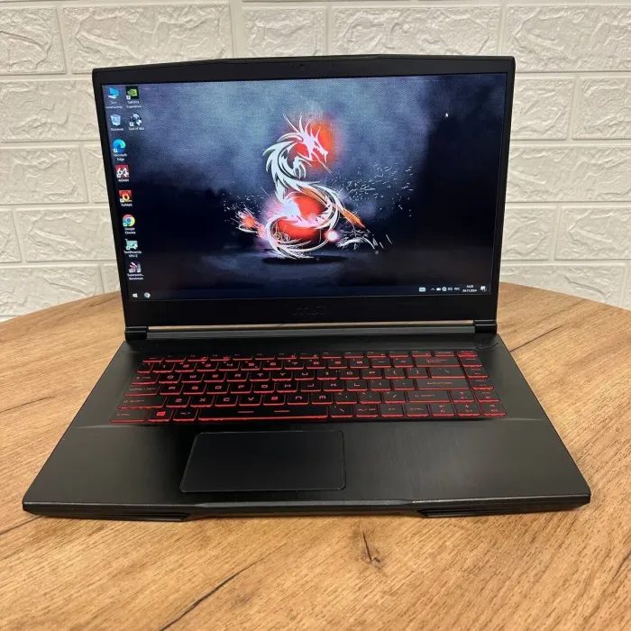 Ігровий ноутбук Б-клас MSI GF65 Thin 9SD / 15.6" (1920x1080) IPS / Intel Core i5-9300H (4 (8) ядра по 2.4 - 4.1 GHz) / 8 GB DDR4 / 512 GB SSD / nVidia GeForce GTX 1660 Ti, 6 GB GDDR6, 192-bit / WebCam б/в - зображення 2