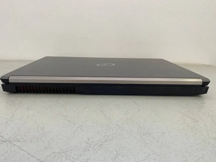 Мобільна робоча станція Fujitsu Celsius H730 / 15.6" (1920x1080) IPS / Intel Core i7-4810MQ (4 (8) ядра по 2.8 - 3.8 GHz) / 16 GB DDR3 / 256 GB SSD / nVidia Quadro K1100M, 2 GB GDDR5, 128-bit / WebCam / DVD-ROM б/в - зображення 5