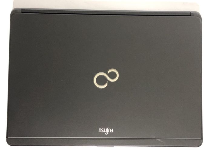 Ноутбук Fujitsu LifeBook S761 / 13.3" (1366x768) TN / Intel Core i5-2520M (2 (4) ядра по 2.5 - 3.2 GHz) / 8 GB DDR3 / 250 GB HDD / Intel HD Graphics 3000 / WebCam / DVD-ROM б/в - зображення 7