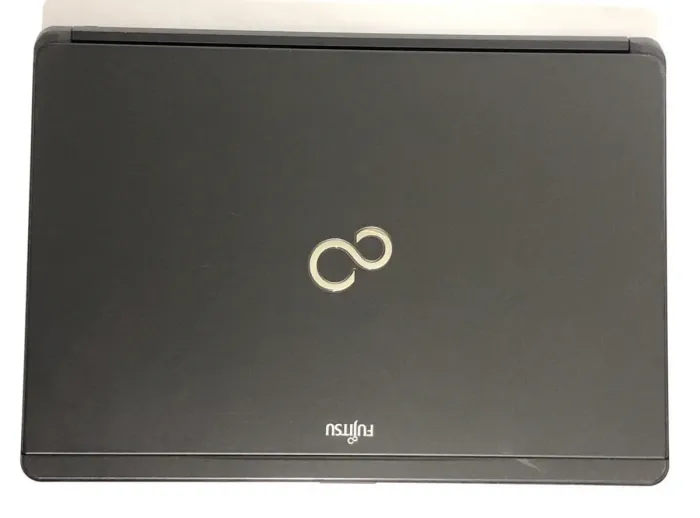 Ноутбук Fujitsu LifeBook S761 / 13.3" (1366x768) TN / Intel Core i5-2520M (2 (4) ядра по 2.5 - 3.2 GHz) / 8 GB DDR3 / 250 GB HDD / Intel HD Graphics 3000 / WebCam / DVD-ROM б/в - зображення 7