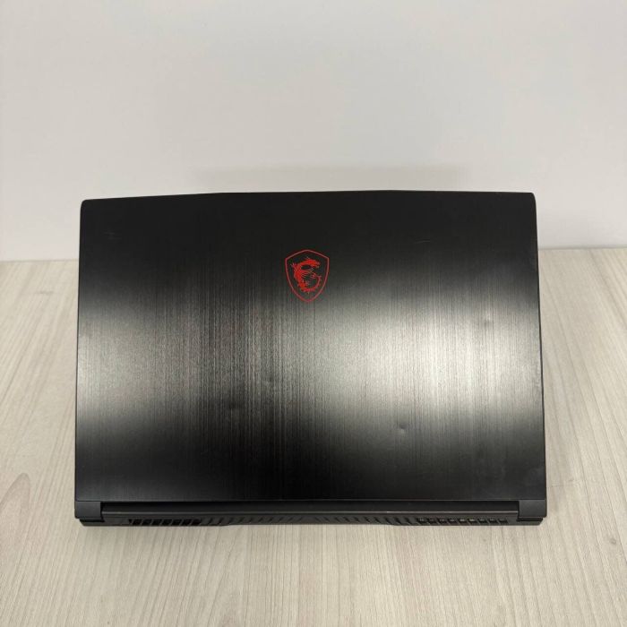 Ігровий ноутбук Б-клас MSI GF65 Thin 10SER / 15.6" (1920x1080) IPS / Intel Core i7-10750H (6 (12) ядер по 2.6 - 5.0 GHz) / 16 GB DDR4 / 512 GB SSD NVMe / nVidia GeForce RTX 2060, 6 GB GDDR6, 192-bit / WebCam б/в - зображення 3