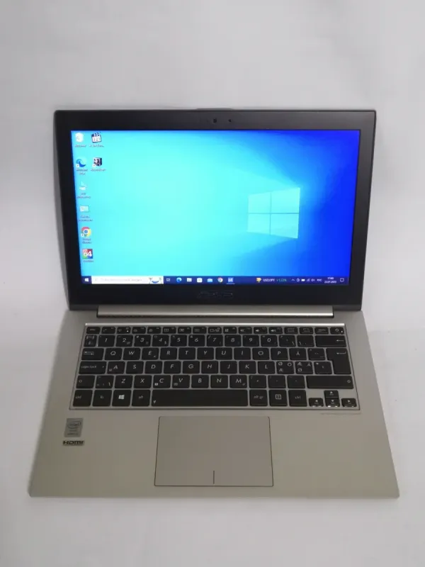Ультрабук Asus ZenBook UX31LA / 13.3'' (1600x900) TN / Intel Core i5-4200U (2 (4) ядра по 1.6 - 2.6 GHz) / 4 GB DDR3 / 128 GB SSD / Intel HD Graphics 4400 / WebCam / micro HDMI / Win 10 Pro б/в - зображення 2