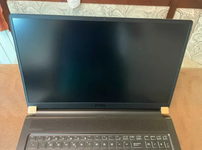 Ігровий ноутбук MSI GS75 Stealth 9SG / 17.3" (1920x1080) IPS / Intel Core i7-9750H (6 (12) ядра по 2.6 - 4.5 GHz) / 32 GB DDR4 / 1000 GB SSD / nVidia GeForce RTX 2080, 8 GB GDDR6, 256-bit / WebCam б/в - зображення 4