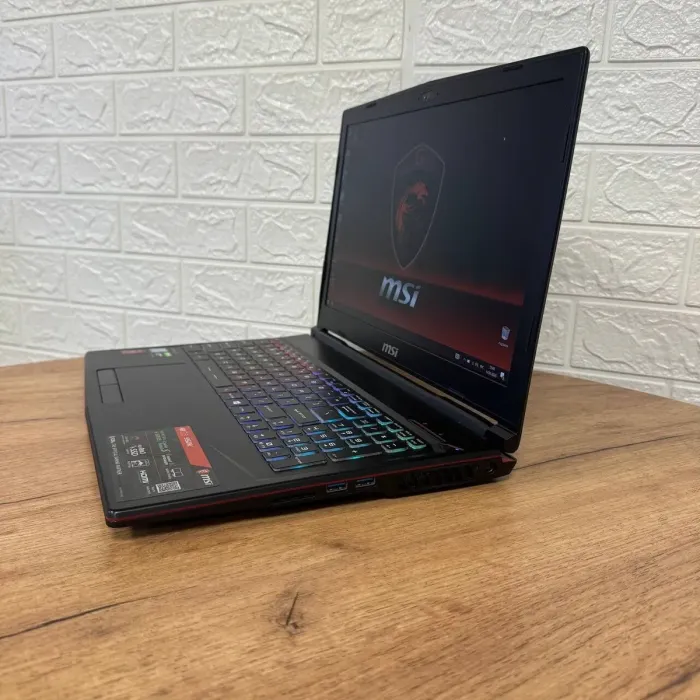 Ігровий ноутбук Б-клас MSI GL63 9SDK / 15.6" (1920x1080) IPS / Intel Core i7-9750H (6 (12) ядер по 2.6 - 4.5 GHz) / 16 GB DDR4 / 512 GB SSD / nVidia GeForce GTX 1660 Ti, 6 GB GDDR6, 192-bit / WebCam б/в - зображення 5