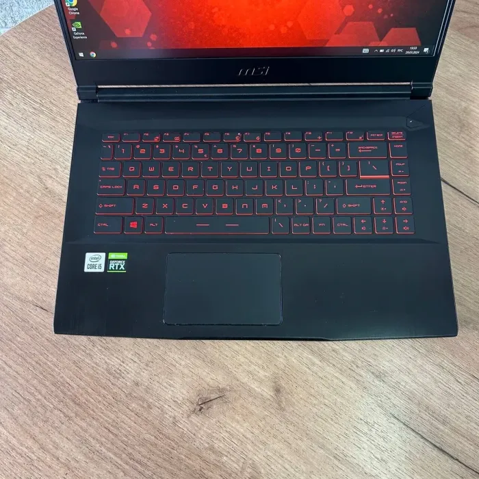 Ігровий ноутбук MSI GF63 Thin 10UD / 15.6" (1920x1080) IPS / Intel Core i5-10500H (6 (12) ядер по 2.5 - 4.5 GHz) / 8 GB DDR4 / 512 GB SSD / nVidia GeForce RTX 3050 Ti, 4 GB GDDR6, 128-bit / WebCam б/в - зображення 7