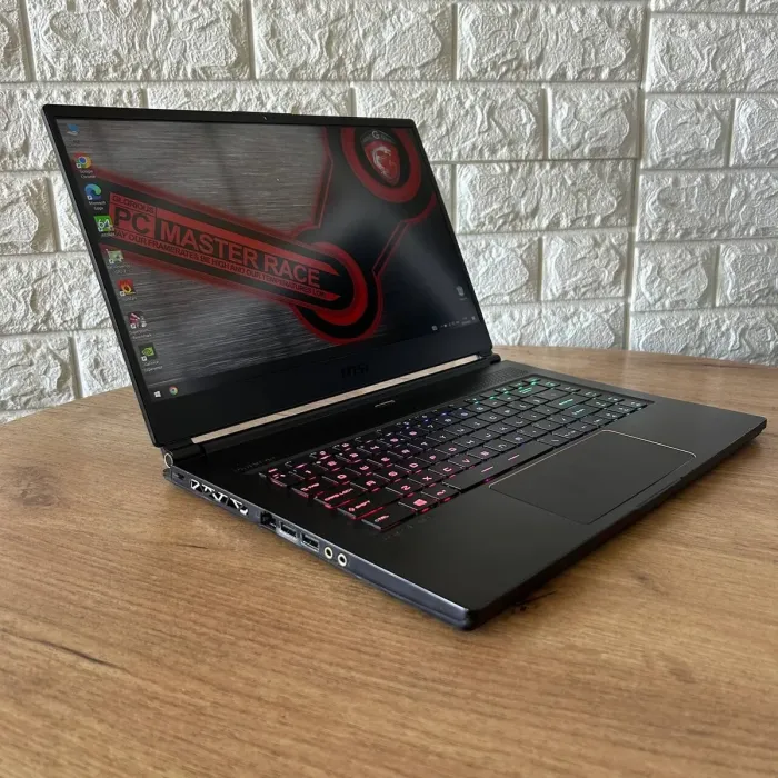 Ігровий ноутбук Б-клас MSI GS65 Stealth 8SF / 15.6" (1920x1080) IPS / Intel Core i7-8750H (6 (12) ядер по 2.2 - 4.1 GHz) / 32 GB DDR4 / 512 GB SSD / nVidia GeForce RTX 2060, 6 GB GDDR6, 192-bit / WebCam б/в - зображення 4