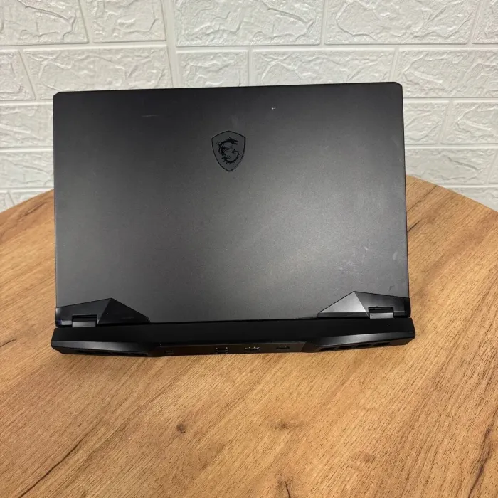 Ігровий ноутбук Б-клас MSI GP66 Leopard 11UH / 15.6" (1920x1080) IPS / Intel Core i7-11800H (8 (16) ядер по 1.9 - 4.6 GHz) / 32 GB DDR4 / 1000 GB SSD NVMe / nVidia GeForce RTX 3080, 8 GB GDDR6, 256-bit / WebCam б/в - зображення 3