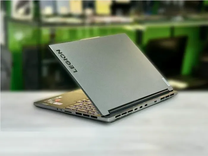 Ігровий ноутбук Lenovo Legion Slim S7 16ARHA7 / 16" (2560x1600) IPS / AMD Ryzen 9 6900HX (8 (16) ядер по 3.3 - 4.9 GHz) / 16 GB DDR5 / 512 GB SSD M.2 / AMD Radeon RX 6800S, 8 GB GDDR6, 128-bit / WebCam / Win 11 Home б/в - зображення 6