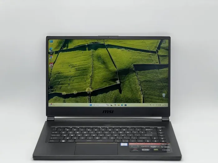 Ігровий ноутбук MSI GS65 Stealth Thin 8RE / 15.6" (1920x1080) IPS / Intel Core i7-8750H (6 (12) ядра по 2.2 - 4.1 GHz) / 16 GB DDR4 / 480 GB SSD / nVidia GeForce GTX 1060, 6 GB GDDR5, 192-bit / WebCam б/в - зображення 2