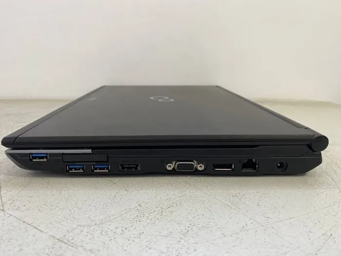 Мобільна робоча станція Б-клас Fujitsu Celsius H720 / 15.6" (1920x1080) TN / Intel Core i7-3720QM (4 (8) ядра по 2.6 - 3.6 GHz) / 32 GB DDR3 / 256 GB SSD / nVidia Quadro K1000M, 2 GB GDDR3, 128-bit / WebCam б/в - зображення 7