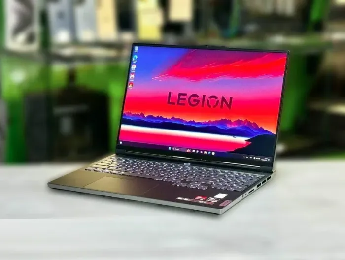 Ігровий ноутбук Lenovo Legion Slim S7 16ARHA7 / 16" (2560x1600) IPS / AMD Ryzen 9 6900HX (8 (16) ядер по 3.3 - 4.9 GHz) / 16 GB DDR5 / 512 GB SSD M.2 / AMD Radeon RX 6800S, 8 GB GDDR6, 128-bit / WebCam / Win 11 Home б/в - зображення 4
