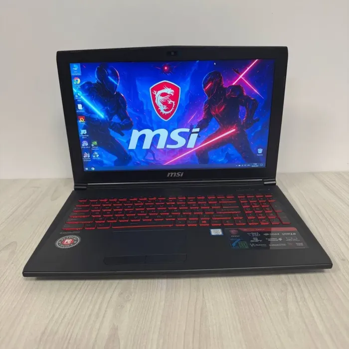 Ігровий ноутбук MSI GL62M 7REX / 15.6" (1920x1080) TN / Intel Core i7-7700HQ (4 (8) ядра по 2.8 - 3.8 GHz) / 16 GB DDR4 / 512 GB SSD M.2 / nVidia GeForce GTX 1050 Ti, 4 GB GDDR5, 128-bit / WebCam б/в - зображення 2