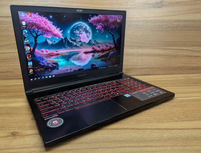 Ігровий ноутбук MSI GS63 / 15.6" (1920x1080) IPS / Intel Core i7-6700HQ (4 (8) ядра по 2.6 - 3.5 GHz) / 16 GB DDR4 / 256 GB SSD + 1000 GB HDD / nVidia GeForce GTX 1060, 6 GB GDDR5, 192-bit / WebCam / Windows 10 б/в - зображення 4