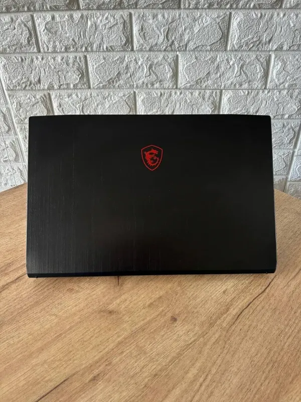 Ігровий ноутбук MSI GF75 Thin 10UEK / 15.6" (1920x1080) IPS / Intel Core i7-10750H (6 (12) ядер по 2.6 - 5.0 GHz) / 16 GB DDR4 / 512 GB SSD + 1000 GB HDD / nVidia GeForce RTX 3060, 6 GB GDDR6, 192-bit / WebCam б/в - зображення 3