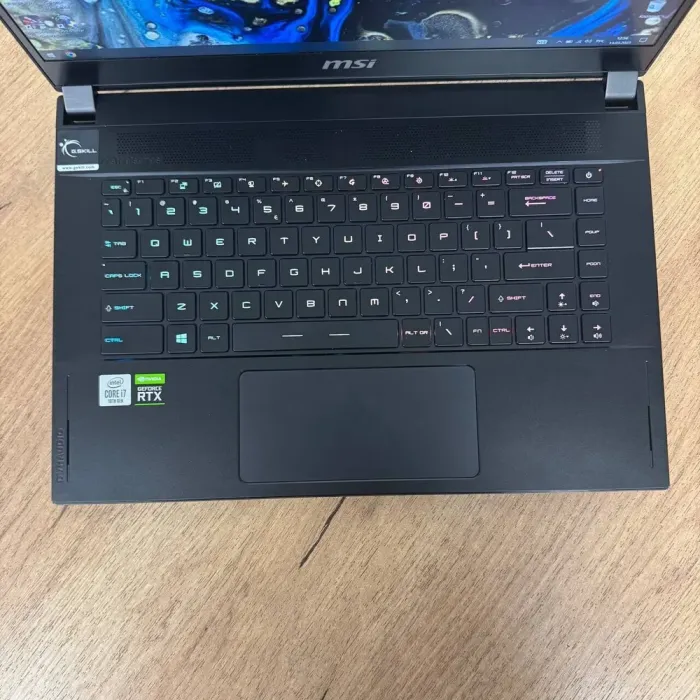 Ігровий ноутбук Б-клас MSI GS66 Stealth 10SE / 15.6" (1920x1080) IPS / Intel Core i7-10750H (6 (12) ядер по 2.6 - 5.0 GHz) / 16 GB DDR4 / 512 GB SSD / nVidia GeForce RTX 2060, 6 GB GDDR6, 192-bit / WebCam б/в - зображення 7