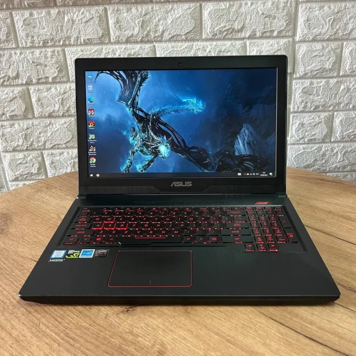 Ігровий ноутбук Б-клас Asus FX503VM / 15.6" (1920x1080) IPS / Intel Core i7-7700HQ (4 (8) ядра по 2.8 - 3.8 GHz) / 16 GB DDR4 / 128 GB SSD M.2 + 1000 GB HDD / nVidia GeForce GTX 1060, 3 GB GDDR5, 192-bit / WebCam б/в - зображення 2