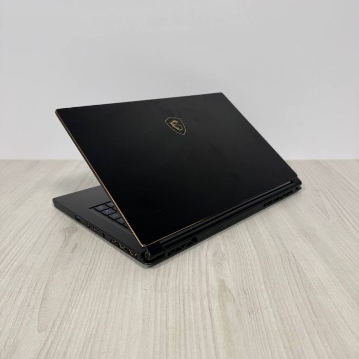 Ігровий ноутбук Б-клас MSI GS65 Stealth 9SE / 15.6" (1920x1080) IPS / Intel Core i7-9750H (6 (12) ядер по 2.6 - 4.5 GHz) / 16 GB DDR4 / 512 GB SSD NVMe / nVidia GeForce RTX 2060, 6 GB GDDR6, 192-bit / WebCam б/в - зображення 6