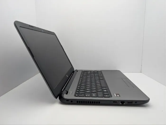Ноутбук HP 15 g003sr / 15.6" (1366x768) TN / AMD A8-6410 (4 ядра по 2.0 - 2.4 GHz) / 8 GB DDR3 / 128 GB SSD / AMD Radeon R5 Graphics / WebCam / DVD-ROM б/в - зображення 4