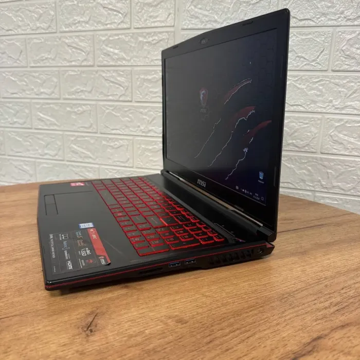 Ігровий ноутбук Б-клас MSI GL63 8RC / 15.6" (1920x1080) IPS / Intel Core i5-8300H (4 (8) ядра по 2.3 - 4.0 GHz) / 8 GB DDR4 / 128 GB SSD M.2 + 1000 GB HDD / nVidia GeForce GTX 1050, 2 GB GDDR5, 128-bit / WebCam б/в - зображення 5