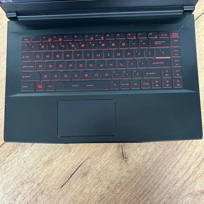 Ігровий ноутбук Б-клас MSI GF65 Thin 9SD / 15.6" (1920x1080) IPS / Intel Core i5-9300H (4 (8) ядра по 2.4 - 4.1 GHz) / 16 GB DDR4 / 512 GB SSD NVMe / nVidia GeForce GTX 1660 Ti, 6 GB GDDR6, 192-bit / WebCam б/в - зображення 7