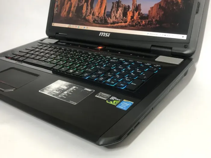 Ігровий ноутбук MSI GT70 2OC / 17.3" (1920x1080) TN / Intel Core i7-4700MQ (4 (8) ядра по 2.4 - 3.4 GHz) / 32 GB DDR4 / 256 GB SSD + 1000 GB HDD / nVidia GeForce GTX 770M, 3 GB GDDR5, 192-bit / WebCam / DVD-ROM б/в - зображення 9
