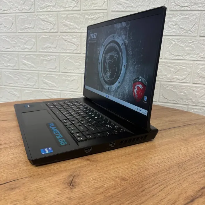 Ігровий ноутбук Б-клас MSI GP66 Leopard 11UG / 15.6" (1920x1080) IPS / Intel Core i7-11800H (8 (16) ядер по 1.9 - 4.6 GHz) / 16 GB DDR4 / 512 GB SSD / nVidia GeForce RTX 3070, 8 GB GDDR6, 256-bit / WebCam б/в - зображення 5