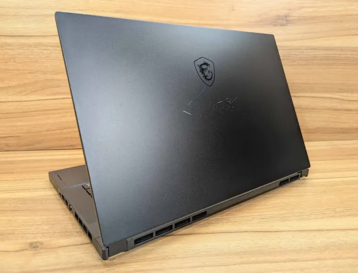 Ігровий ноутбук MSI GS66 / 15,6" (1920x1080) IPS / Intel Core i7-10750H (6 (12) ядер по 2,6 - 5,0 ГГц) / 16 ГБ DDR4 / 1000 ГБ SSD / nVidia GeForce RTX 2070, 8 ГБ GDDR6, 256-біт / Веб-камера / Windows 10 б/в - зображення 7