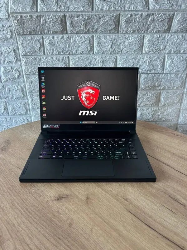 Ігровий ноутбук Б-клас MSI GS66 Stealth 11UE / 15.6" (1920x1080) IPS / Intel Core i7-11800H (8 (16) ядер по 2.3 - 4.6 GHz) / 16 GB DDR4 / 1000 GB SSD / nVidia GeForce RTX 3060, 6 GB GDDR6, 192-bit / WebCam б/в - зображення 2