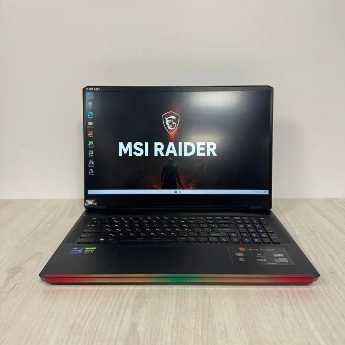 Ігровий ноутбук Б-класу MSI GE76 Raider 11UH / 17,3" (1920x1080) IPS / Intel Core i9-11980HK (8 (16 ядер по 3,3 - 5,0 ГГц) / 32 ГБ DDR4 / 512 ГБ SSD / nVidia GeForce RTX 3080, 16 ГБ GDDR6, 256-біт / WebCam б/в - зображення 2