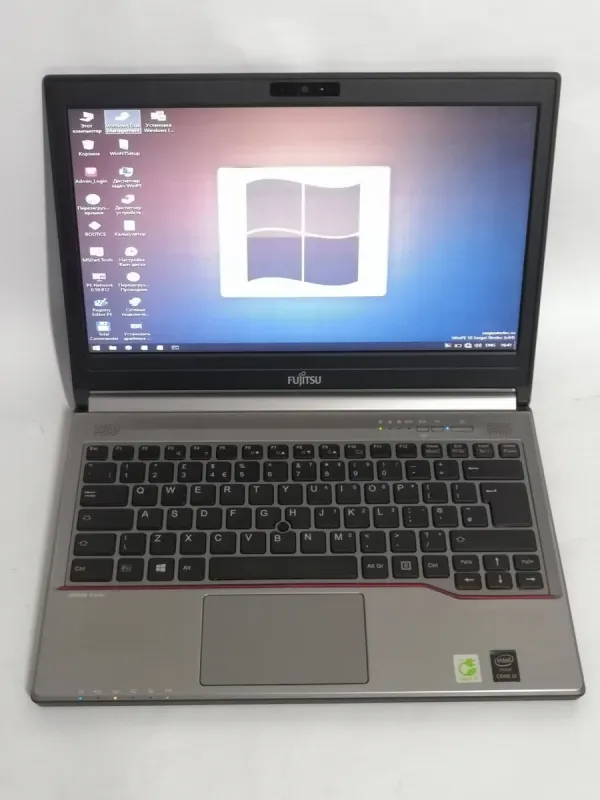 Ноутбук Б-клас Fujitsu LifeBook E734 / 13.3" (1366x768) TN / Intel Core i3-4000M (2 (4) ядра по 2.4 GHz) / 4 GB DDR3 / 500 GB HDD / Intel HD Graphics 4600 / WebCam / Windows 10 Pro б/в - зображення 2