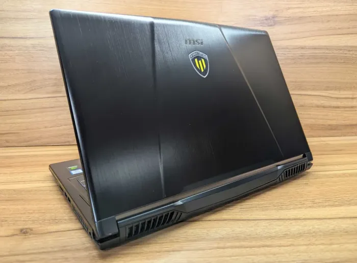 Мобільна робоча станція MSI WE 63 / 15.6" (1920x1080) IPS / Intel Core i7-8750H (6 (12) ядра по 2.2 - 4.1 GHz) / 32 GB DDR4 / 512 GB SSD / nVidia Quadro P2000, 4 GB GDDR5, 128-bit / WebCam / Windows 10 б/в - зображення 7