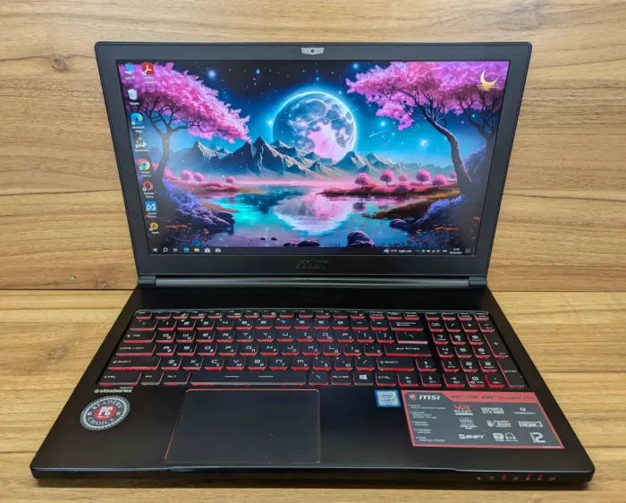 Ігровий ноутбук MSI GS63 / 15.6" (1920x1080) IPS / Intel Core i7-6700HQ (4 (8) ядра по 2.6 - 3.5 GHz) / 16 GB DDR4 / 256 GB SSD + 1000 GB HDD / nVidia GeForce GTX 1060, 6 GB GDDR5, 192-bit / WebCam / Windows 10 б/в - зображення 2