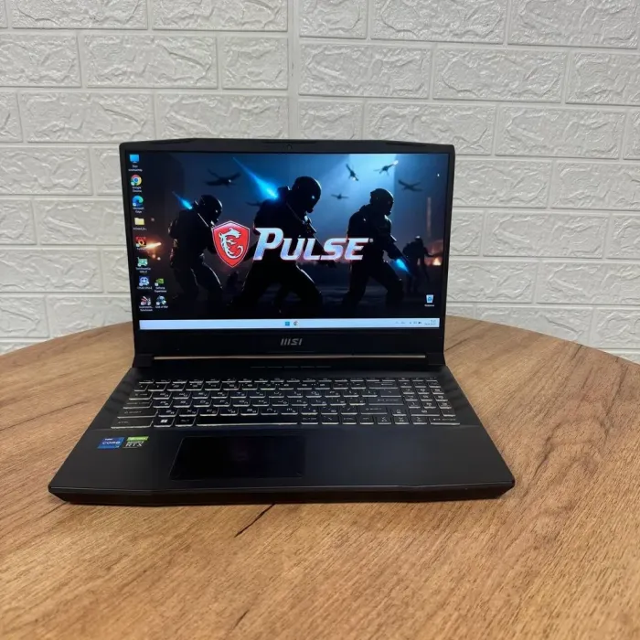 Ігровий ноутбук Б-клас MSI Pulse GL66 12UGKV / 15.6" (1920x1080) IPS / Intel Core i7-12700H (14 (20) ядер по 3.5 - 4.7 GHz) / 16 GB DDR4 / 1000 GB SSD / nVidia GeForce RTX 3070, 8 GB GDDR6, 256-bit / WebCam б/в - зображення 2