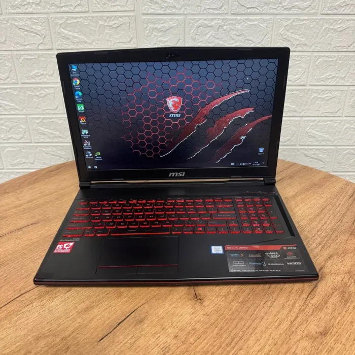 Ігровий ноутбук Б-клас MSI GL63 8RC / 15.6" (1920x1080) IPS / Intel Core i5-8300H (4 (8) ядра по 2.3 - 4.0 GHz) / 8 GB DDR4 / 128 GB SSD M.2 + 1000 GB HDD / nVidia GeForce GTX 1050, 2 GB GDDR5, 128-bit / WebCam б/в - зображення 2