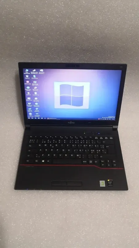 Ноутбук Fujitsu Lifebook E544 / 14" (1366x768) TN / Intel Core i5-4210M (2 (4) ядра по 2.6 - 3.2 GHz) / 4 GB DDR3 / 128 GB SSD / Intel HD Graphics 4600 / WebCam / DVD-ROM б/в - зображення 2