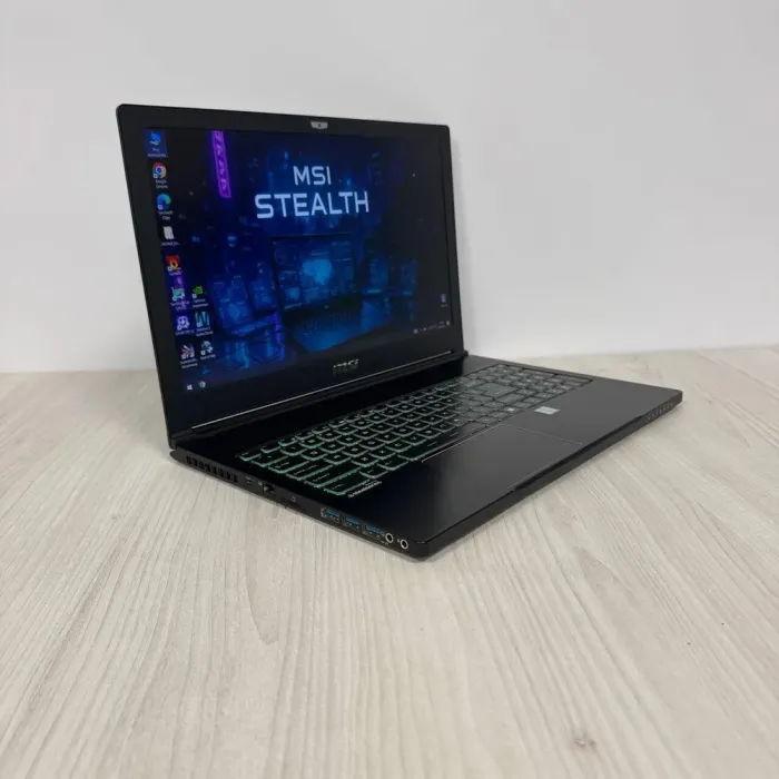 Ігровий ноутбук Б-клас MSI GS63VR 7RF Stealth Pro / 15.6" (1920x1080) TN / Intel Core i7-7700HQ (4 (8) ядра по 2.8 - 3.8 GHz) / 16 GB DDR4 / 256 GB SSD M.2 / nVidia GeForce GTX 1060, 6 GB GDDR5, 192-bit / WebCam б/в - зображення 4