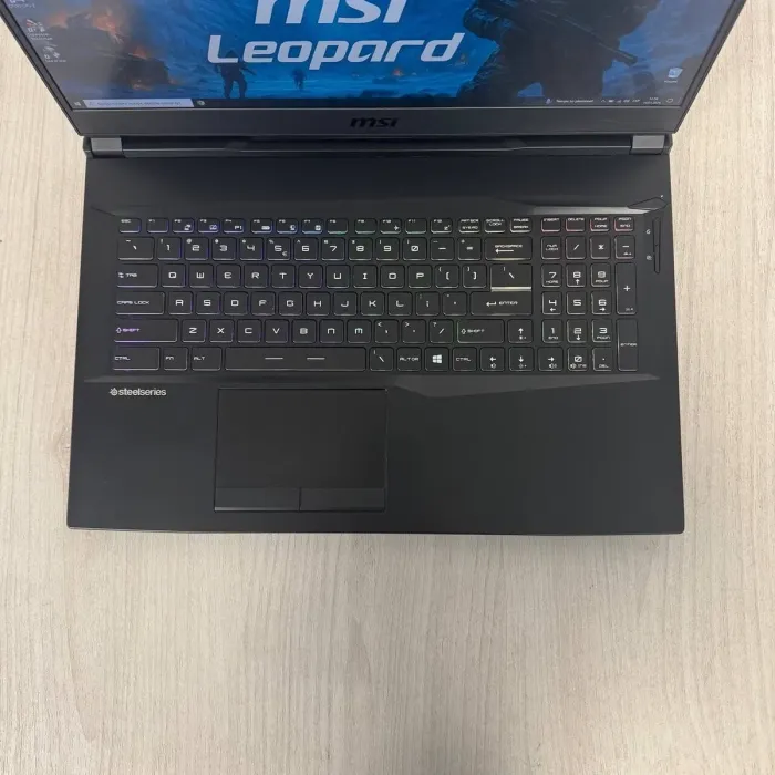 Ігровий ноутбук Б-класу MSI GL75 Leopard 10SFK / 17.3" (1920x1080) IPS / Intel Core i7-10750H (6 (12) ядер по 2.6 - 5.0 GHz) / 16 GB DDR4 / 1000 GB SSD / nVidia GeForce RTX 2070, 8 GB GDDR6, 256-bit / WebCam б/в - зображення 3