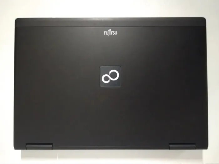 Ноутбук Fujitsu LifeBook E780 / 15.6" (1366x768) TN / Intel Core i3-330M (2 (4) ядра по 2.13 GHz) / 4 GB DDR3 / 320 GB HDD / Intel HD Graphics / WebCam / DVD-ROM б/в - зображення 7