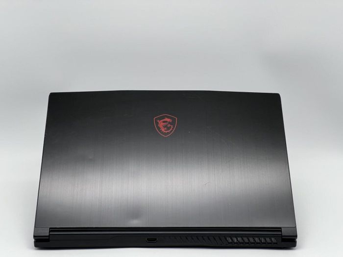 Ігровий ноутбук Б-класу MSI GF63 Thin 9SCXR-005 / 15,6" (1920x1080) IPS / Intel Core i5-9300H (4 (8) ядра по 2,4 - 4,1 ГГц) / 16 ГБ DDR4 / 480 ГБ SSD / nVidia GeForce GTX 1650 Max-Q, 4 ГБ GDDR6, 128-біт / WebCam б/в - зображення 5