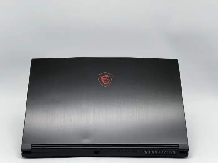 Ігровий ноутбук Б-класу MSI GF63 Thin 9SCXR-005 / 15,6" (1920x1080) IPS / Intel Core i5-9300H (4 (8) ядра по 2,4 - 4,1 ГГц) / 16 ГБ DDR4 / 480 ГБ SSD / nVidia GeForce GTX 1650 Max-Q, 4 ГБ GDDR6, 128-біт / WebCam б/в - зображення 5