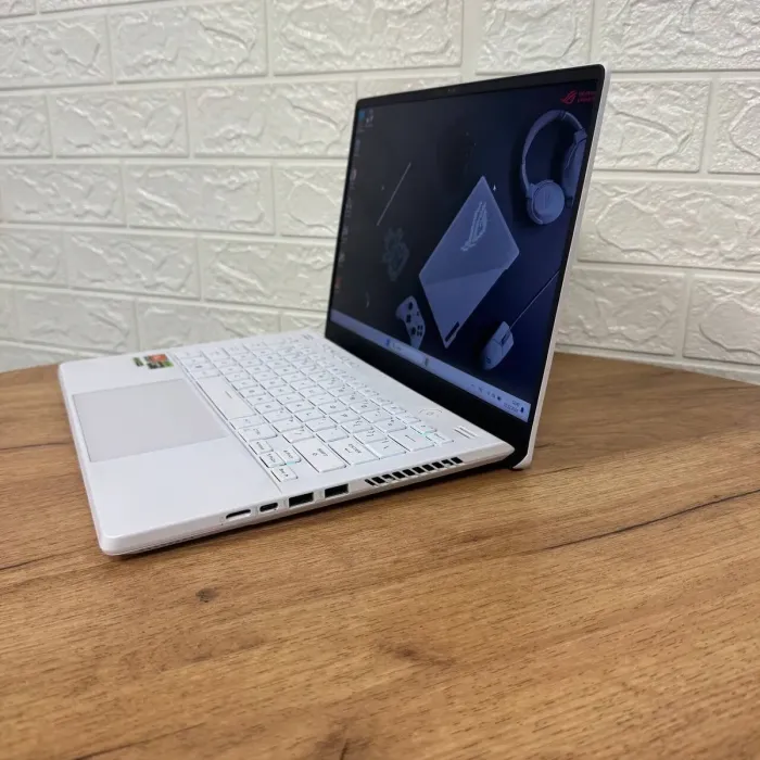 Ігровий ультрабук Б-клас Asus ROG Zephyrus G14 GA402XV / 14" (2560x1600) IPS / AMD Ryzen 9 7940HS (8 (16) ядер по 4.0 - 5.2 GHz) / 16 GB DDR5 / 512 GB SSD / nVidia GeForce RTX 4060, 8 GB GDDR6, 128-bit / WebCam б/в - зображення 5