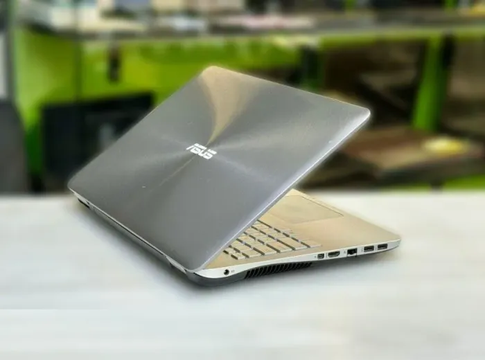 Ігровий ноутбук Б-клас Asus N551V / 15.6" (3840x2160) IPS / Intel Core i7-6700HQ (4 (8) ядра по 2.6 - 3.5 GHz) / 16 GB DDR4 / 128 GB SSD M.2 + 1000 GB HDD / nVidia GeForce GTX 960M, 4 GB GDDR5, 128-bit / WebCam / DVD-RW / Win 10 Home б/в - зображення 5