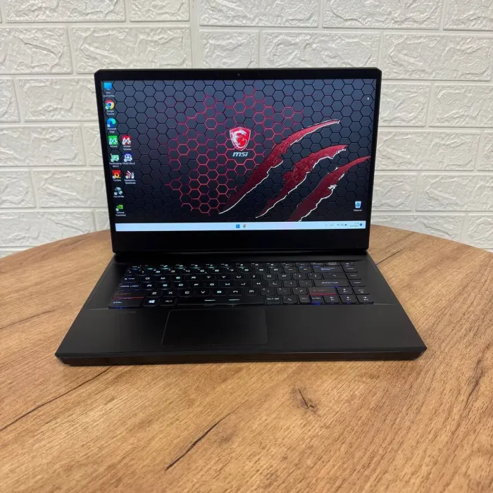 Ігровий ноутбук Б-клас MSI GP66 Leopard 11UH / 15.6" (1920x1080) IPS / Intel Core i7-11800H (8 (16) ядер по 1.9 - 4.6 GHz) / 32 GB DDR4 / 1000 GB SSD NVMe / nVidia GeForce RTX 3080, 8 GB GDDR6, 256-bit / WebCam б/в - зображення 2