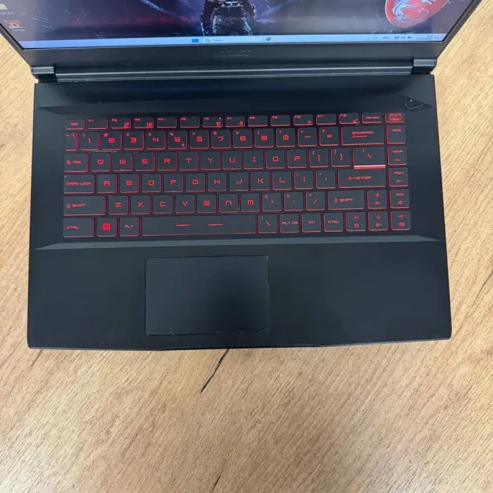 Ігровий ноутбук Б-клас MSI GF63 Thin 11SC / 15.6" (1920x1080) IPS / Intel Core i5-11400H (6 (12) ядер по 2.7 - 4.5 GHz) / 8 GB DDR4 / 256 GB SSD / nVidia GeForce GTX 1650 Max-Q, 4 GB GDDR6, 128-bit / WebCam б/в - зображення 7
