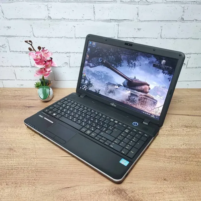 Ноутбук Б-клас Fujitsu LifeBook A512 / 15.6" (1366x768) TN / Intel Core i3-3110M (2 (4) ядра по 2.4 GHz) / 8 GB DDR3 / 120 GB SSD / Intel HD Graphics 4000 / WebCam / DVD-ROM / VGA б/в - зображення 3