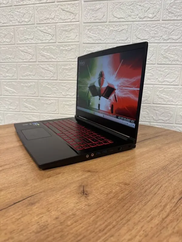 Ігровий ноутбук Б-клас MSI GV15 Thin 11SCV / 15.6" (1920x1080) IPS / Intel Core i5-11400H (6 (12) ядер по 2.7 - 4.5 GHz) / 8 GB DDR4 / 256 GB SSD / nVidia GeForce GTX 1650 Max-Q, 4 GB GDDR6, 128-bit / WebCam б/в - зображення 5